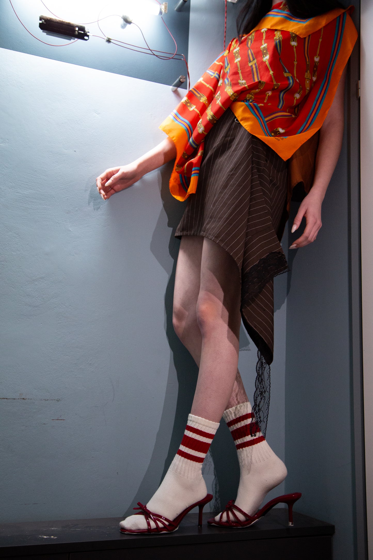 Asymmetric Pinstripe Mini Skirt with Lace Detail
